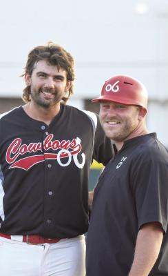 Cowboys slugger James Prockish stands with manager Lance Myers sporting smiles after their win over the Roswell Invaders. Photo courtesy of Julie Myers