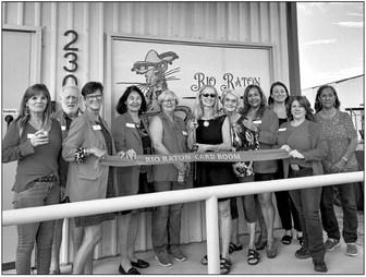 Rio Raton Card Room, operated by Rhonda Cole held its grand opening and ribbon cutting last Thursday. The card room will only be open on Friday and Saturday nights. Pictured are Alpine Ambassadors Dona Ward, Rick Kelly, Judy Stokes, Sara Bow-Gluck, Gerri Davis, owner Rhonda Cole, Shirley Biellier, Eva Olivas, Catherine Eaves, Lauren Sanders, and Juanita Garcia. Photo by Kara Gerbert
