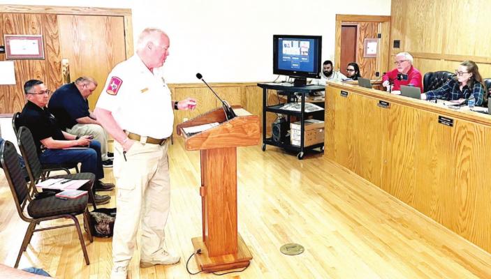 EMS supervisor Greg Henington addresses Brewster County Commissioners Court on March 4 during a discussion of EMS providers for the county. Avalanche photo by Gail Diane Yovanovich