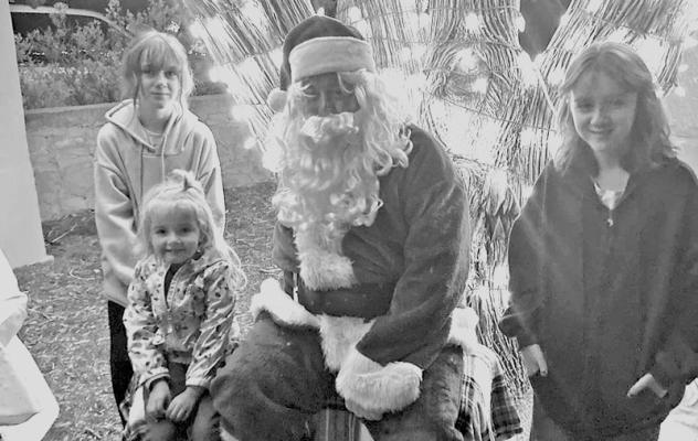 Josephine, Virginia, and Augustine Nott of Fort Davis took time this past Saturday to tell Santa what they all wanted for Christmas. Courtesy photo