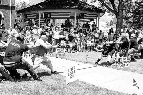 The Alpine Volunteer Fire Department took on members of the U.S. Border Patrol in a tug-of-war competition during Fourth of July festivities held at the Brewster County Courthouse last Thursday. The AVFD was the undisputed champion, winning all three attempts against the USBP. Photo by Kara Gerbert
