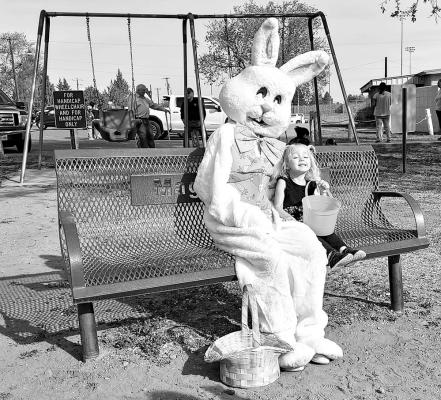 Zandolyn Welch poses for a picture with the Easter Bunny after the annual Kiwanis easter egg hunt held on Saturday morning. Photo by Kara Gerbert