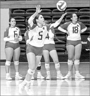 Loren Garcia prepares to serve a ball to the visiting Le Tourneau Yellowjackets this past Saturday. Photo courtesy of Kayley Diaz