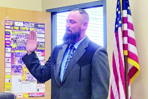 Josh Cross was sworn in as Alpine ISD Board’s Single Member District 7 trustee last Wednesday. Cross replaces trustee Mary McCallister, as she steps down after 11 years of service on the board. Photo by Kerry Laird