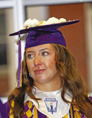 Not only is Kody Hawkins an outstanding athlete, but she’s also tops in academia, as shown here with her National Honor Society shawl and her multiple honor cords. Photo by Kara Gerbert