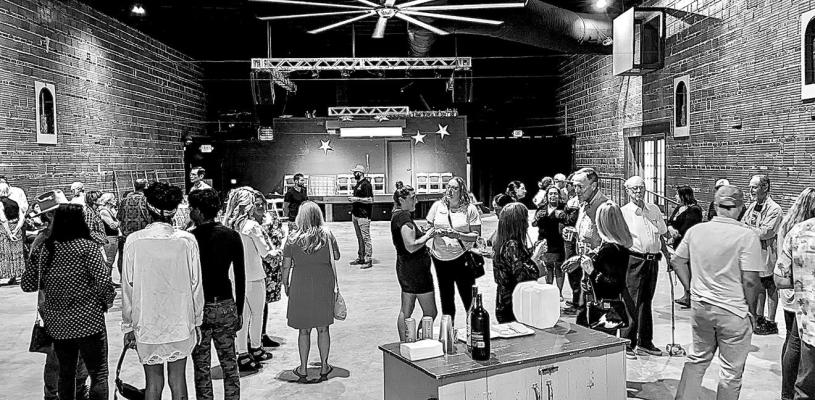 The Granada Theater mixer for business owners and non-profit organizations was a smash on Aug. 17, where owner Benjamin Garcia spoke to the crowd of well-wishers. Photo by Beth Peabody
