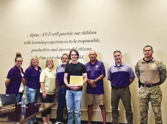 Jake Esparza is pictured here with the Alpine ISD School Board after he was awarded the AISD Board Scholarship. From left are board members Haley Babb, Mary McCallister, Niki Ahrens, and Eddie Natera, Esparza, and board members Joe Portillo, Dr. Adrian Billings, and Jimmy Morris. Photo by Kara Gerbert