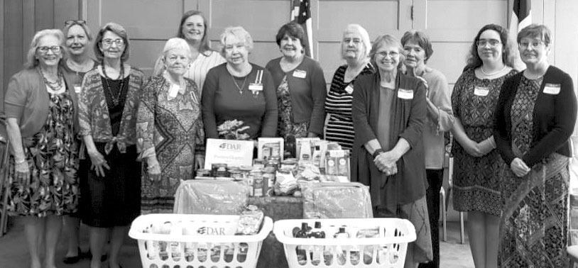 Service organization donates to family crisis center