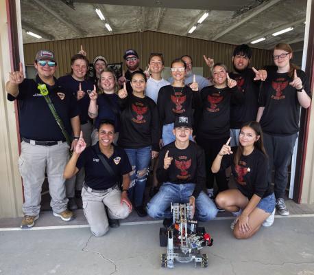 The Terlingua High School robotics team, the Purobots, is headed to the state competition. Terlingua CSD held a Robotics Open House fundraiser on April 12 to earn funds for the team to travel to Corpus Christi for the competition. The Terlingua Fire and EMS personnel attended the event in support of these Terlingua students. Photo courtesy of TFEMS