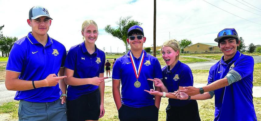 David Baca sports his district medal while surrounded by his teammates. Baca, a freshman was the District Champ, winning the title by three strokes. Pictured is the AHS golf team of Zach Wash, Piper Wash, David Baca, Sye Barraza, and Matthew Solis.