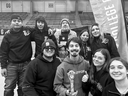 Terlingua Big Bend High School robotics team includes Ervey Sotelo, Zachary Noll, Luna Barrett, and Brooke Jenks. Pictured in the back are Anael Armendariz, Severino Alday, Coach Brad Anthenat, Maria Ramirez, and Jennyfer Orozco.