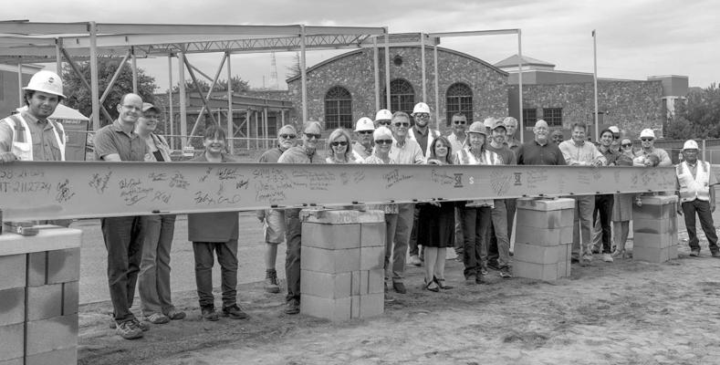 Signing the beam at the museum