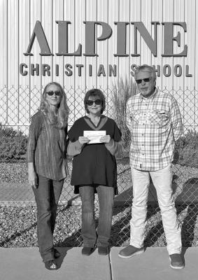 The Alpine Christian School recently received donations from the Big Bend Shooting Foundation and the Big Bend Sportman’s Club. These funds will be used to purchase firearms for the school’s annual gun raffle fundraiser. Presenting the donations to ACS secretary Debbie Skelton were Rhonda Cole (left) and Jim Westermann (right). Courtesy photo
