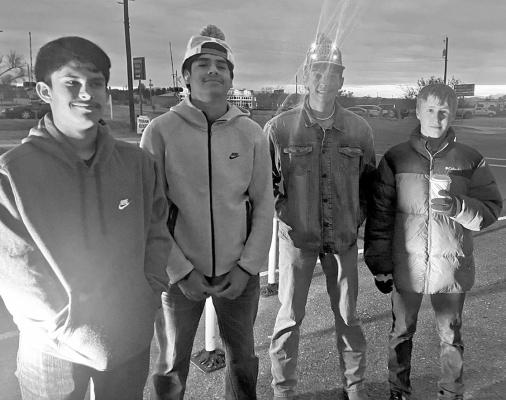Marathon ISD students Marcos Briones, Joe David Gonzales, Kaden Whetten, and Teegan Whetten enjoyed hanging out on the main street in Marathon this past Saturday night as the community celebrated their annual Fiesta de Noche Buena. Courtesy photo