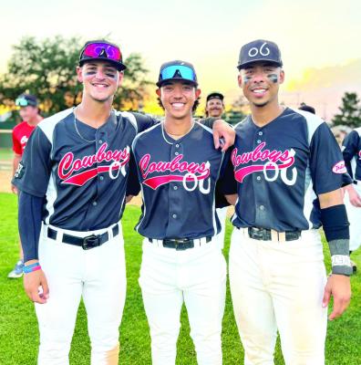 Sean Becker, Trevor Tripoli, and Kyle Rodriguez are all smiles after their win over the Roswell Invaders. Photo by Julie Myers