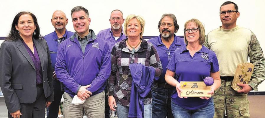 Outgoing Alpine ISD Superintendent Becky McCutchen joins trustees Adrian Billings, Mary McCallister, Nikki Ahrens, Joe Portillo, Justin Cross, Eddie Natera, and Jimmy Morris during Board Appreciation Month at the Jan. 19 meeting. Avalanche photo by Roxanne Hill