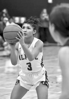 Alpine Lady Buck senior Hope Dominguez sets herself up at the free throw line. Photo by Felipe Fierro