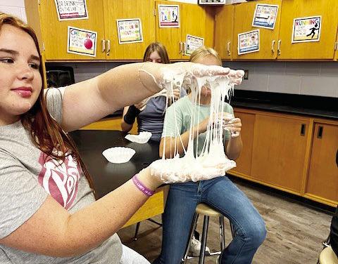 Rynn Matthews works on making marshmallows into taffy during her STEAM class at Alpine Middle School. Courtesy photo