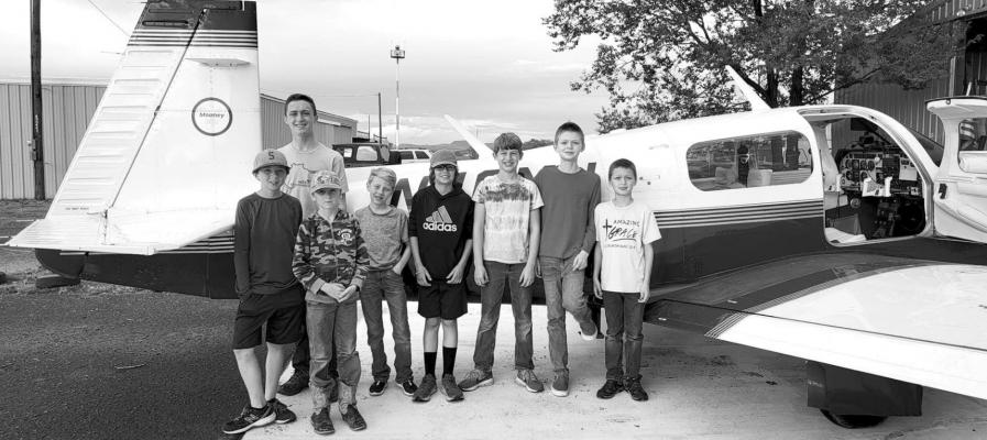 Scouts of Trail Life TX Troop 0040 gather at Louis Traveland’s hangar at Alpine’s municipal airport on Aug. 17. Avalanche photo by Roxanne Hill