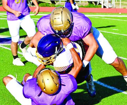 The Fightin’ Buck defense showed the Eagles that they should ‘Fear the Deer,’ taking down their offense and keeping them scoreless during last Friday’s scrimmage at Buck Stadium. Photo by Felipe Fierro