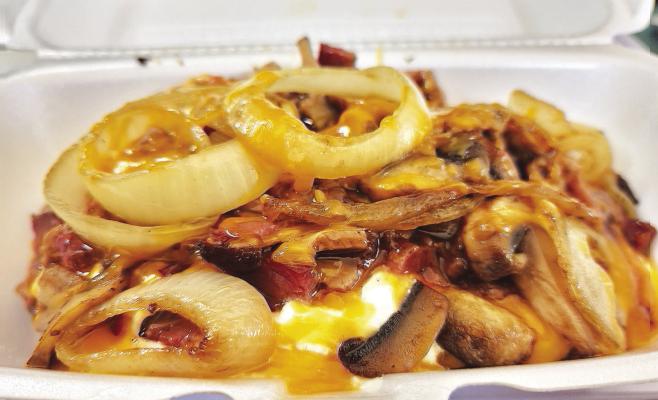Texas Tater with BBQ brisket, butter, sour cream, cheese, and grilled onions and mushrooms. Avalanche photo by Kara Gerbert