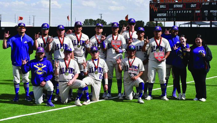 The Alpine Fightin’ Bucks baseball team proudly displays their well-earned hardware after sweeping the competition in Wink over the weekend. Photo courtesy of Noe Lujan