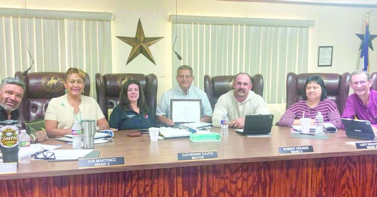 The Alpine City Council is pictured here with Alpine City Manager Henry Arredondo (center), who poses with his certificate for completing the Texas Certified Public Manager coursework through Texas State University. This is a nationally recognized credential designed for public sector officials focusing on strengthening ethical leadership, improving managerial effectiveness, and enhancing the quality of public administration. Photo courtesy of Abel Hinojos
