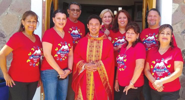 Rev. Victorino Loresca of Our Lady of Peace Catholic Church joins Matachines Danza Guadalup members Eva Olivas, Dayami Fernandez, Carmen Dominguez, Ruth Macias, Ramon Olivas, Martha Sanchez, Blanca Caughman, and Kirk Caughman. Courtesy photo
