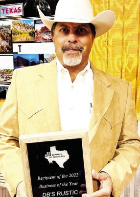 Don Bauchman, owner of DB’s Rustic Iron BBQ received the the Business of the Year award from the Big Bend Chamber at their first annual Winter Gala. Courtesy photo