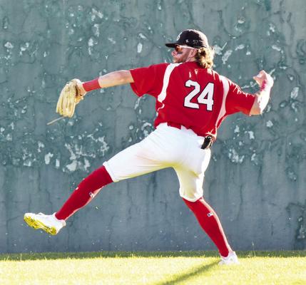 Cowboys right fielder Drew Bayard throws a ball back to the infield during the Alpine Cowboys game against the Garden City Wind at Kokernot Field June 12. Photo by Julie Meyers