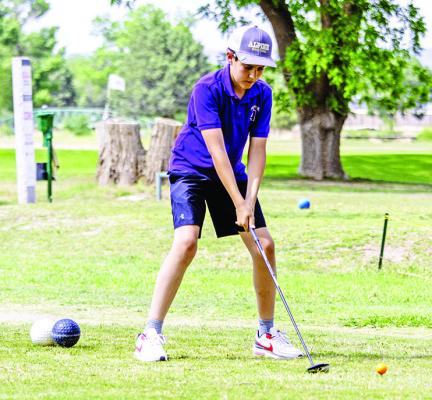 Nicholas Duran-McMillen prepares to tee off during Tuesday’s Alpine Middle School golf tournament. Photo by Kara Gerbert