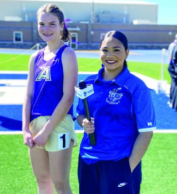 Molly Garrett is interviewed by Fort Stockton’s student media after her win in the 3200m race. Courtesy photo