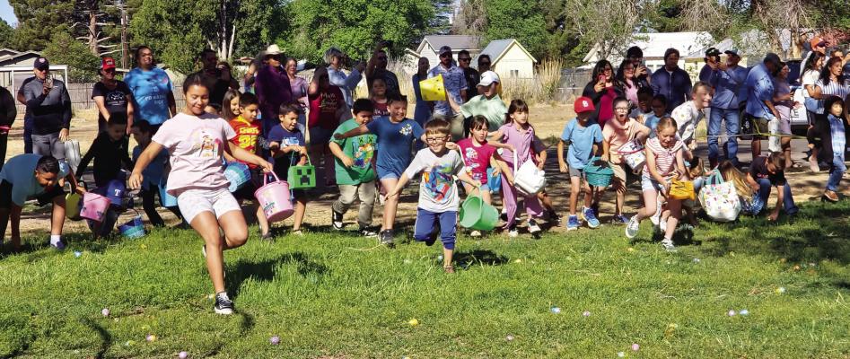 Local kids from toddlers on up were on hand Saturday morning at the annual Kiwanis Easter egg hunt at Kokernot Park. Around 100 children participated in the event, armed with bags and baskets as their parents documented their excitement and smiles. Photo by Kara Gerbert