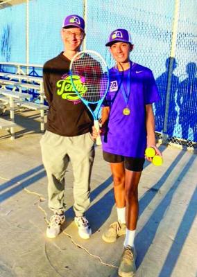8th-grader Roman Holguin is pictured with Assistant Coach Nathan Struthers after he clinched the Boys’ Singles Championship in Fort Stockton on Saturday. Courtesy photo