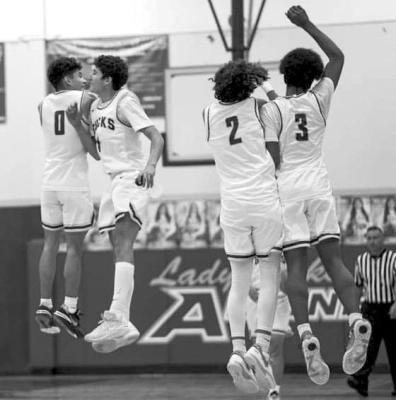 	Bucks win first district game in Crane