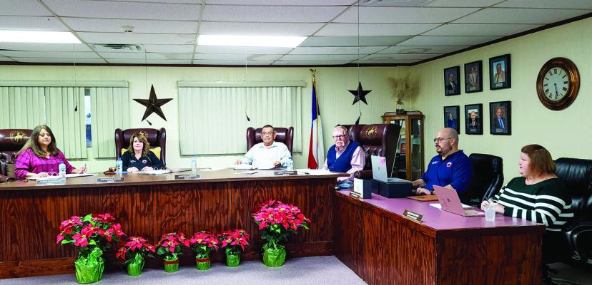 Members of the Alpine City Council Chris Rodriguez, Ward 2, Mayor Catherine Eaves, Martin Sandate, Ward 4, Jerry Johnson, Ward 5, City Secretary, Geo Calderon and City Manager, Megan Antrim prepare to begin last night’s regularly scheduled meeting. Avalanche photo by Kara Gerbert