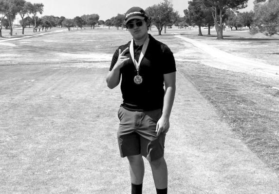 Alpine High School sophomore David Baca posed for a photo with his medal after winning the Monahans Fall Invitation.