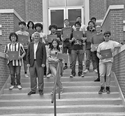 Campers were presented with a certificate of completion by Dr. Oguzhan Basibuyuk, professor and chair of the Department of Homeland Security and Criminal Justice. Courtesy photo