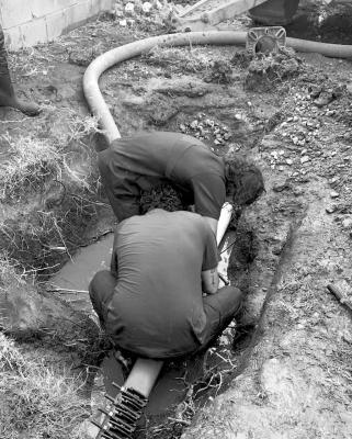 Workers from the utilities department with the City of Alpine worked diligently recently when a water main broke in the vicinity of Harriet and June streets. Courtesy photo