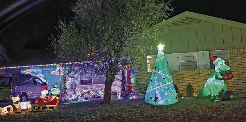Blow-up decorations have become a popular option for all holidays, but especially during Christmas time when you can see everything from Santa to Rudolph, to Frosty, and even a T-Rex or two. Photo by Kara Gerbert