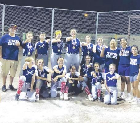 Softball team swings at the competition
