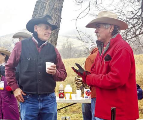 Phillip Wildman and George Delgado chat over coffee at the 2024 Lonestar Cowboy Poetry Gathering’s Chuckwagon Breakfast. Photo by Kara Gerbert