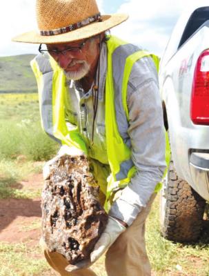 Showing off the find of the day, rockhound Fred Hall drove from Boulder, Colo., to look for large, quality agates at the Kokernot o6 Ranch with Take A Hike. Photo by Shawna Graves