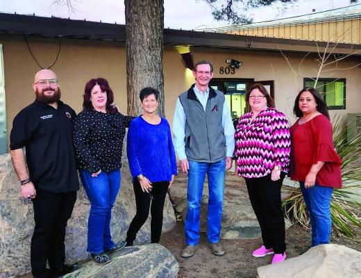 The members of the Alpine City Council commemorate the first meeting of 2024 outside the council chambers. Pictured here, from left to right, are City Secretary Geo Calderon, Mayor Catherine Eaves, council members Judy Stokes, Ward 1 and Rick Stephens, Ward 5, City Manager Megan Antrim, and council member Chris Rodriguez, Ward 2. Photo by Joh Covington