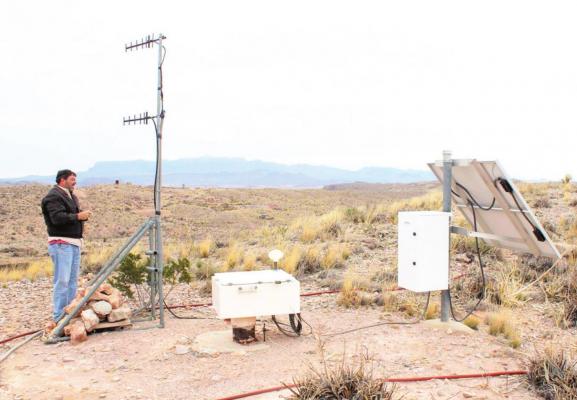 A Southern Methodist University researcher checks on the seismic array between Terlingua and Lajitas. Courtesy photo