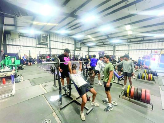 Weight training is a big part of preparing for fall sports. Courtesy photo