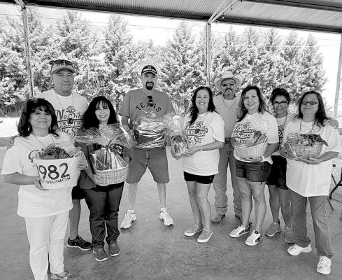 It was an exciting day to remember the good times and catch up on life for members of the Marfa High School Class of 1982 as they met at a reunion luncheon at the Marfa Visitors Center pavilion on Sept. 3 during the Marfa Lights Festival. Pausing for a photo are Marfa Shorthorns 1982 alumni Nora Valerio, Omar Mediano, Rita Sanchez, Diana Salgado, Rita Garcia, Brenda Perez, Frank Gonzales, Scott Taylor, and Virgie Pallarez. Avalanche photo by Roxanne Hill