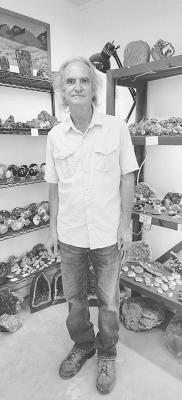 Paul Graybeal stands by his rock shop in Marfa. Avalanche photo by Roxanne Hill