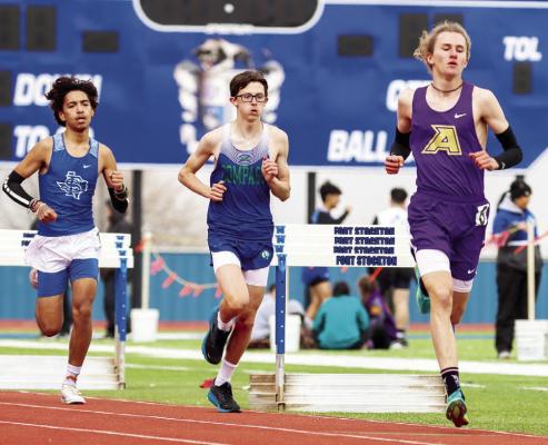 Hatfield Cason leads his opponents during the 800M distance run at this past weekend’s Comanche Relays. Cason placed first in the 800M, 1600M, and 3200M. Photo by Shawn Yorks