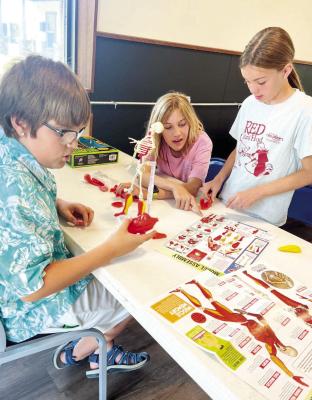 Students in Marathon don’t just learn in the classroom. The Marathon Public Library offers them a chance to explore beyond the school-designated curriculum, as these students are doing at Camp Curiosity. Photo courtesy of Marfa Public Library